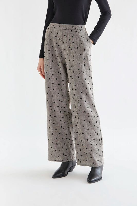 Pantalón tweed gris con flores negras bordadas — fotografía oficial 1